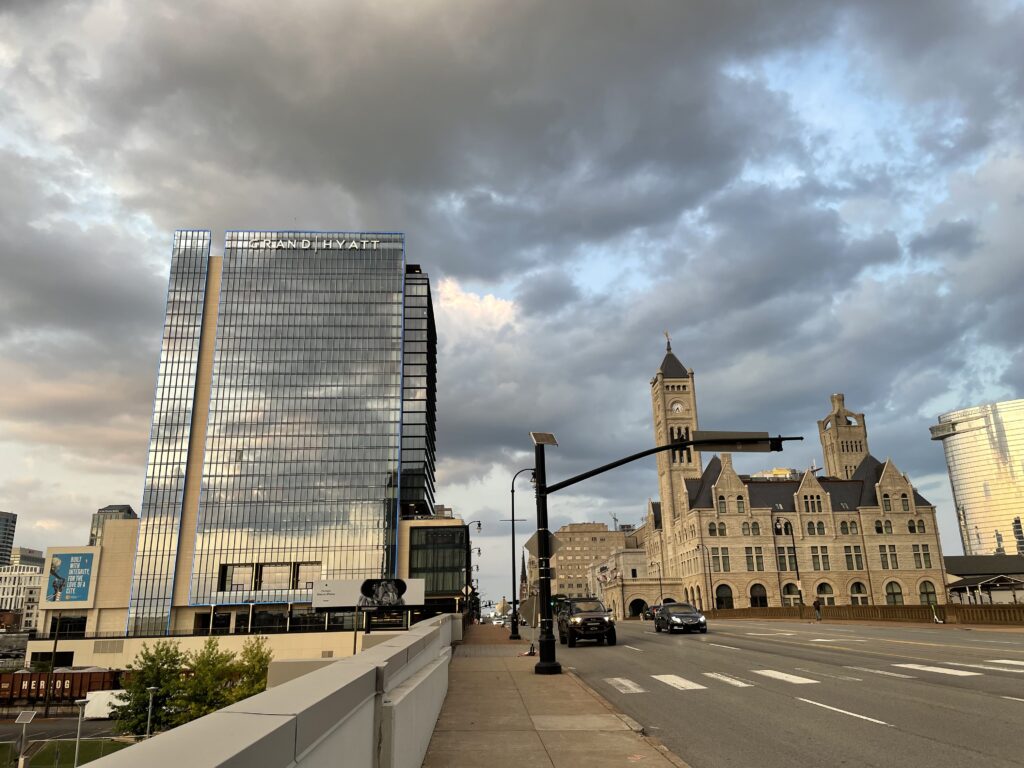 Grand Hyatt Nashville at sunset across from Union Station